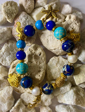 Load image into Gallery viewer, Exotic Turquoise, Blue Jasper and Blue Agate Gemstone Stretch Bracelet with Gold Filled Marine Charms
